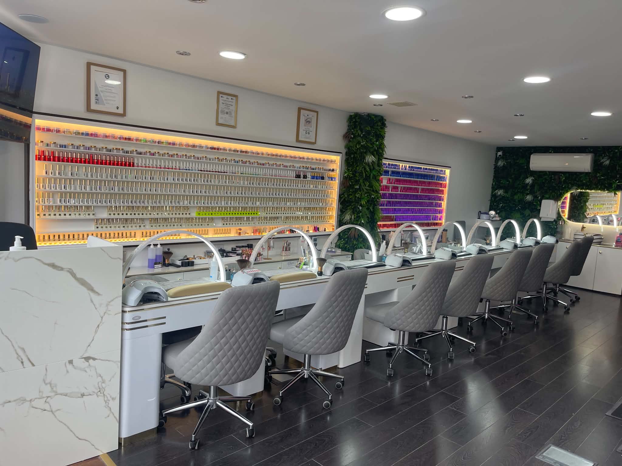 Hessle Nails & Spa manicure bar and polish wall